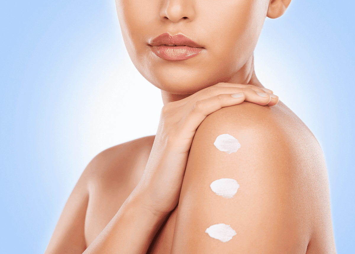 beautiful woman posing with moisturized shoulder