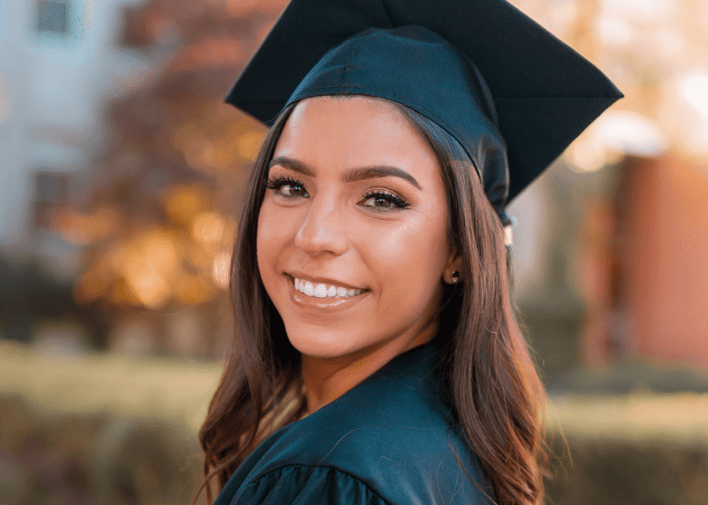 Young girl smiling graduation makeup