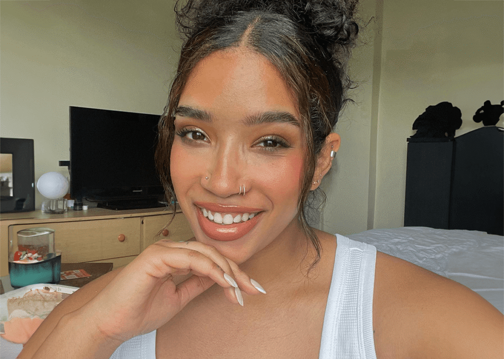 A woman with different tones applied to her face