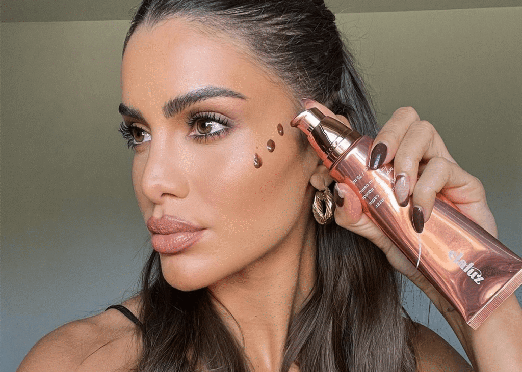Liquid bronzer being pumped directly onto face